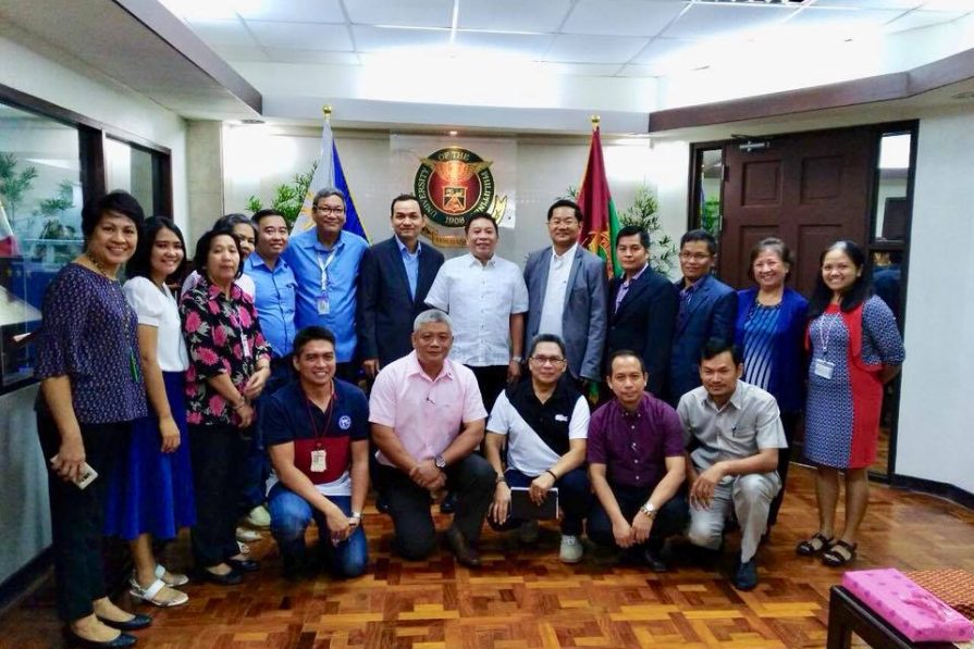 Svay Rieng University officials pose with counterparts from University of Philippines Los Baños